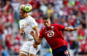 Sven Botman i kamp mod Kasper Dolberg i Ligue 1