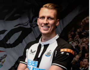 Newcastle bekræfter, at de har hentet Premier League-konkurrenten Brighton & Hove Albions forsvarsspiller Dan Burn.