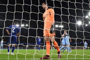 En noget slukøret Courtois efter en City-scoring.