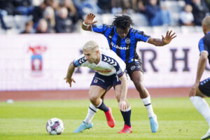 Jack Wilshere i duel med Emmanuel Sabbi