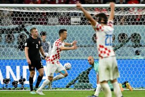 Kroatiens spillere jubler over sejren over Canada.