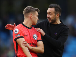 Leandro Trossard er velkommen tilbage i varmen i Brighton siger klubbens manager Robert De Zerbi.