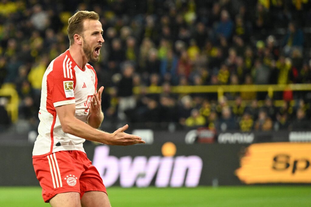 Harry Kane jubler efter at have lavet hattrick mod Dortmund.