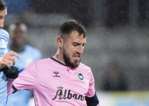 Bashlim Kadrii løber i regnen