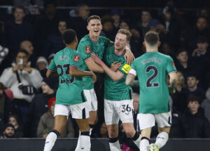 Newcastles spillere jubler efter en scoring