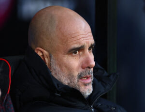 Guardiola sidder på bænken