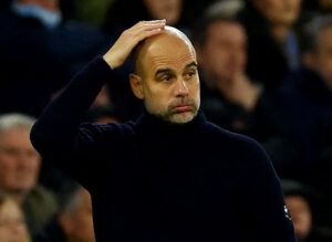 Pep Guardiola tager sig til hovedet for Manchester City