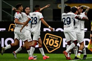 Cagliari-spillerne jubler efter at have udlignet mod Inter.