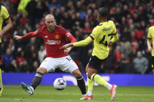 Christian Eriksen dribler for Manchester United mod Burnley.