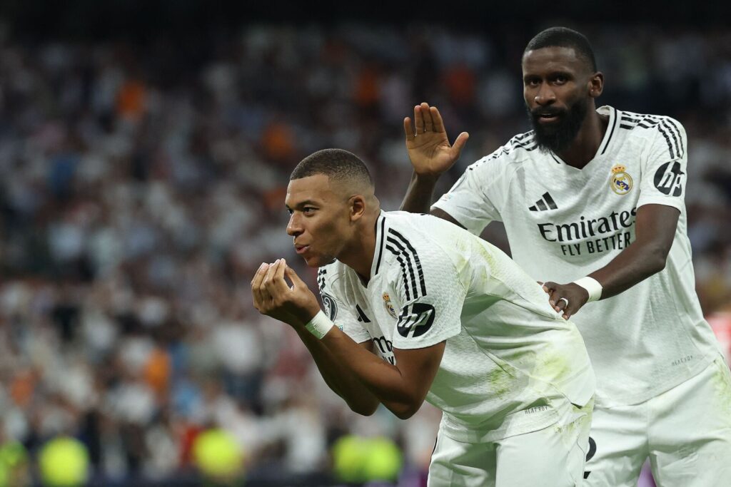 Kylian Mbappé fejrer en scoring for Real Madrid i Champions League.