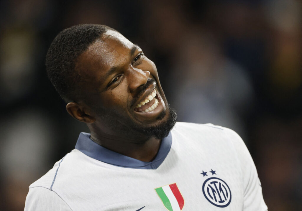 Marcus Thuram smiler efter en scoring i Champions League