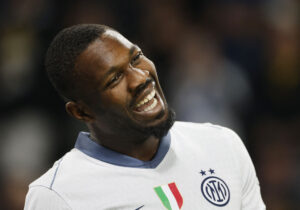Marcus Thuram smiler efter en scoring i Champions League