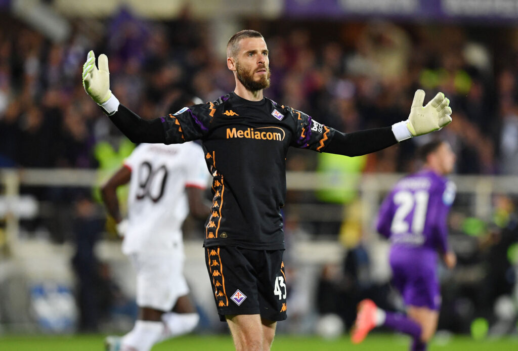 David de Gea jubler efter en af sine to straffesparksredninger mod AC MIlan.