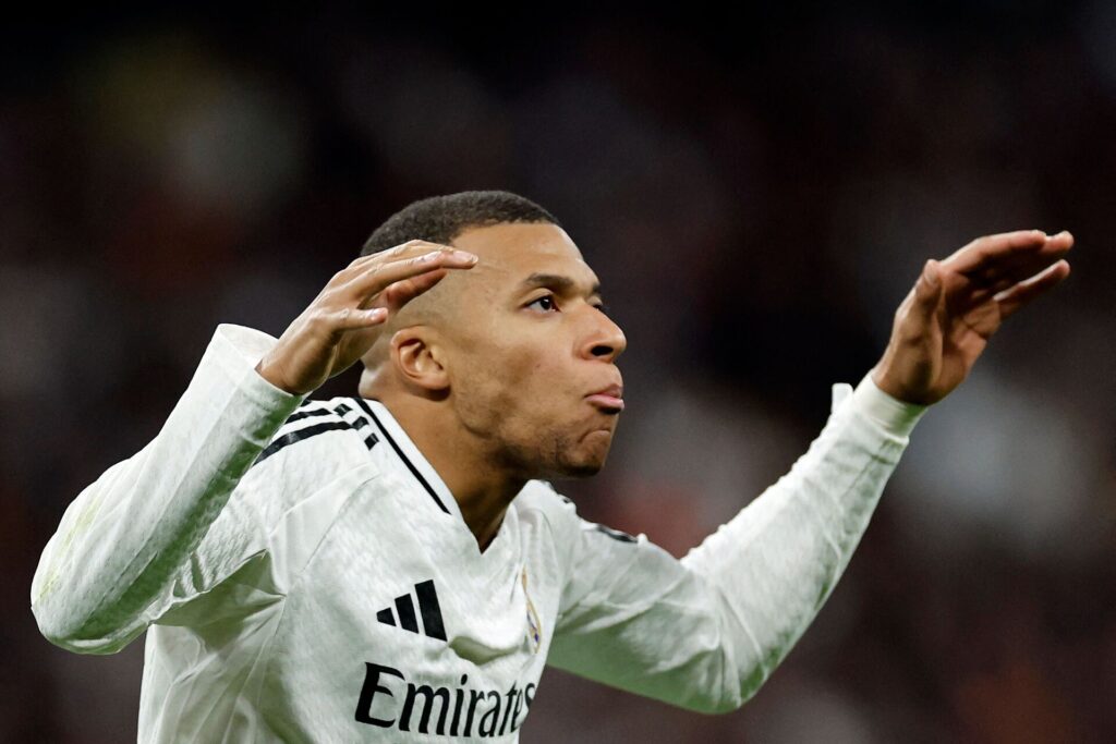 Kylian Mbappé fejrer en scoring for Real Madrid.