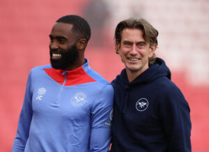 Thomas Frank og Justin Cochrane griner sammen.