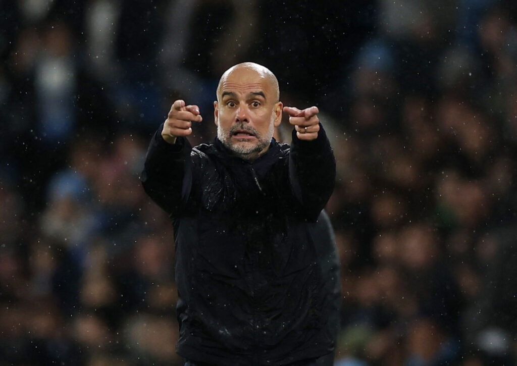 Pep Guardiola på sidelinjen for Manchester City.