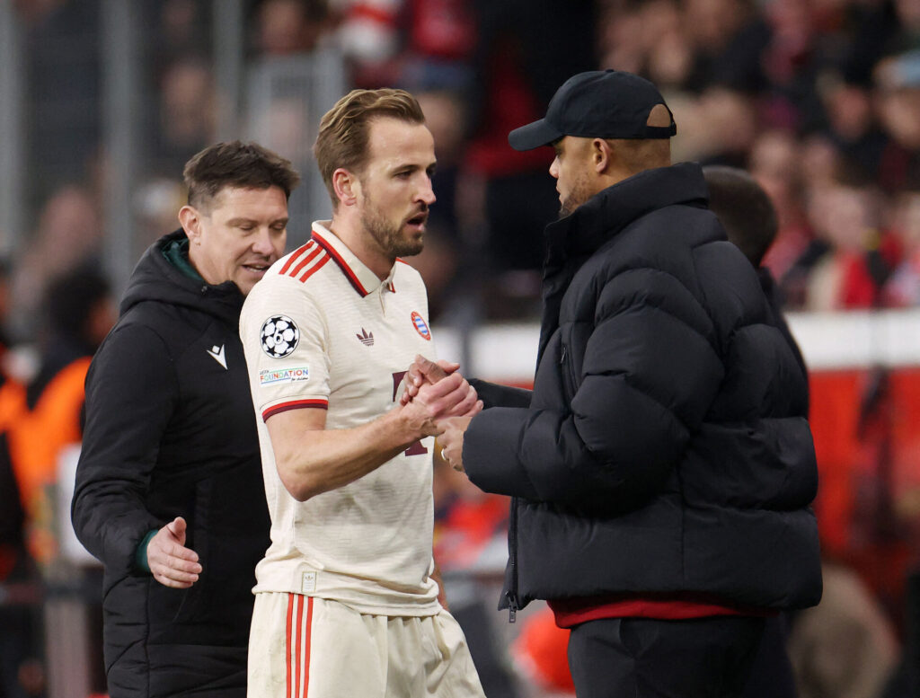 Vincent Kompany og Harry Kane i en highfive.