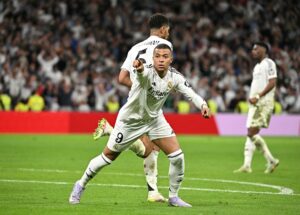 Kylian Mbappé fejrer en scoring for Real Madrid.