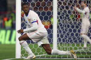 Ousmane Dembele under en kamp for Frankrig.