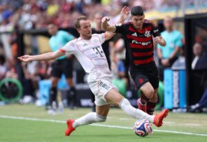 Harry Kane i en tackling mod Flamengo.
