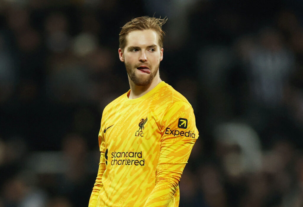 Kelleher slikker sig om munden.