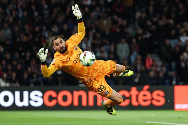 (FILES) Paris Saint-Germains Italian goalkeeper #99 Gianluigi Donnarumma eyes the ball during the French L1 football match between Paris Saint-Germain (PSG) and Olympique Lyonnais (Lyon) at the Parc des Princes stadium in Paris on April 21, 2024. European champions Paris Saint-Germain have reached agreement with Lille to sign highly-rated goalkeeper Lucas Chevalier, a source close to the negotiations told AFP on August 8, 2025. The move is likely to pose questions over the future of Italian international keeper Gianluigi Donnarumma at Paris Saint-Germain (PSG). (Photo by Franck FIFE / AFP)