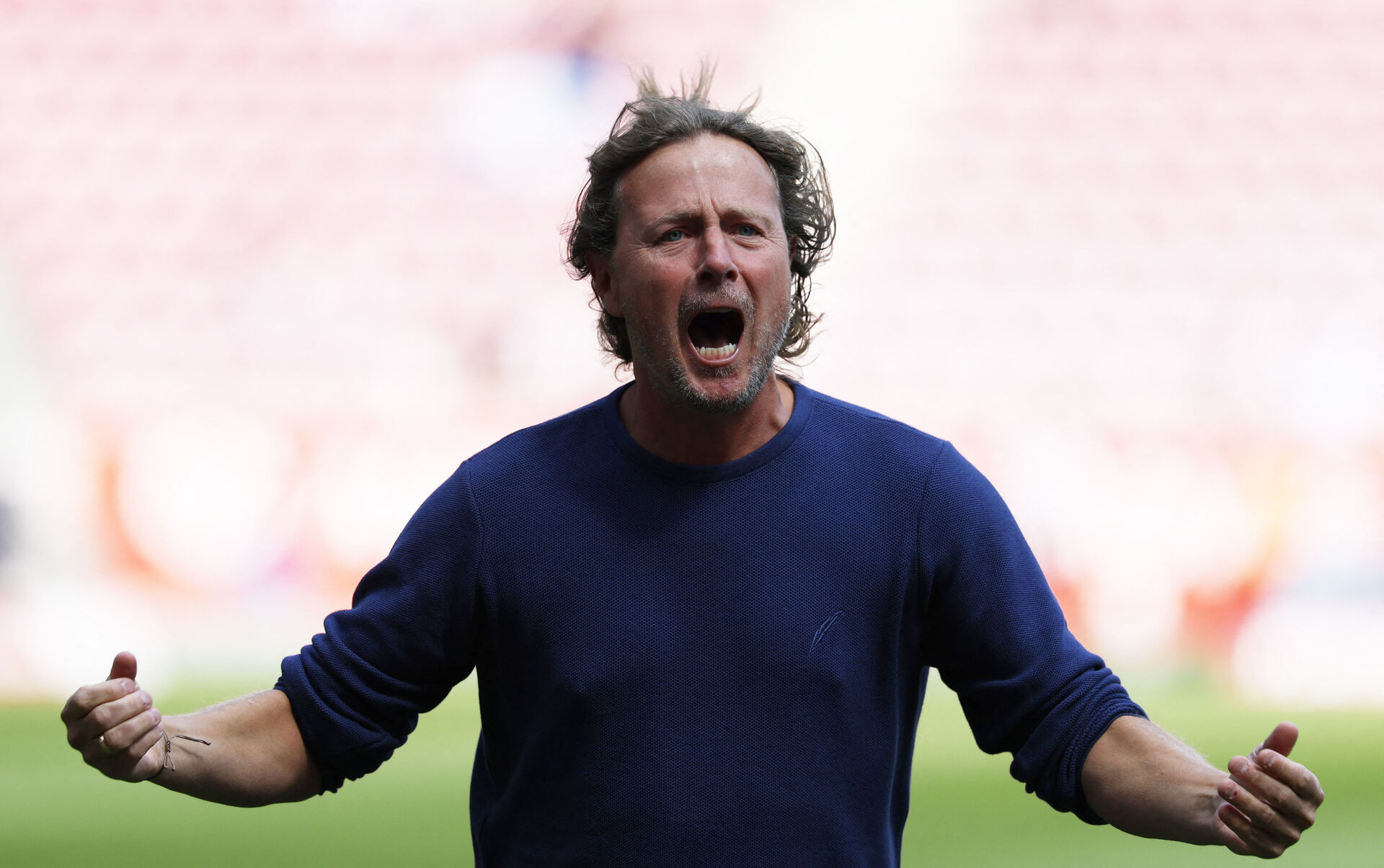 Bo Henriksen jubler under en kamp i spidsen for Mainz 05