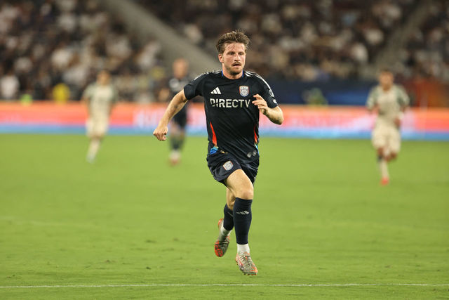 Aug 23, 2025; San Diego, California, USA; San Diego FC midfielder Anders Dreyer (10) runs for the ball during the second half against the Portland Timbers at Snapdragon Stadium. Mandatory Credit: Julia Kapros-Imagn Images