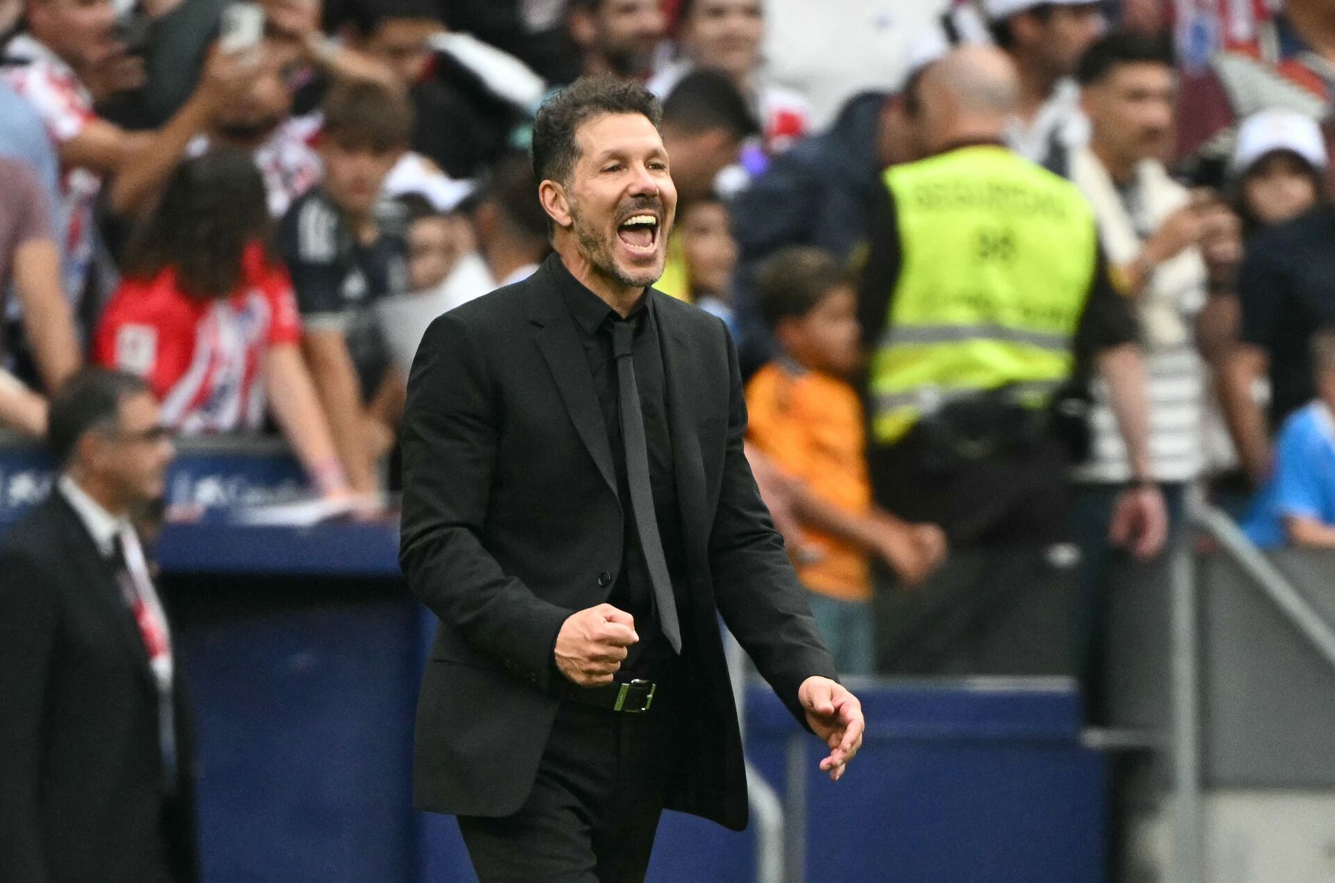 Diego Simeone griner under en atletico madrid-kamp