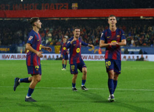 Soccer Football - LaLiga - FC Barcelona v Getafe - Johan Cruyff Stadium, Barcelona, Spain - September 21, 2025 FC Barcelonas Dani Olmo celebrates scoring their third goal with Fermin Lopez and Marc Casado REUTERS/Albert Gea