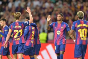 FC Barcelona-spillere giver highfive.