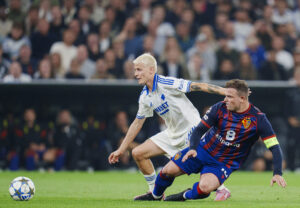 Magnus Mattsson tackler Xherdan Shaqiri.