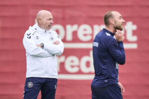 Christian Eriksen og Brian Riemer under et træningspas.