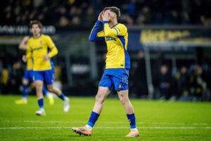 Marko Divkovic med ansigtet i hænderne.