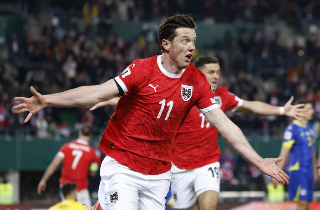 Michael Gregoritsch jubler efter sin scoring mod Bosnien.