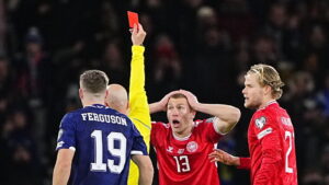 Rasmus Nissen Kristensen reagerer efter rødt kort på Hampden Park mod Skotland.