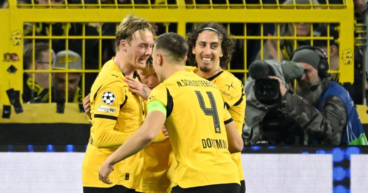 Dortmund-profil raser mod holdkammerater Foto: Photo by INA FASSBENDER 