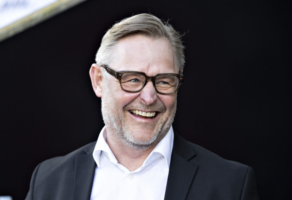 Claus Steinlein er ét stort smil.