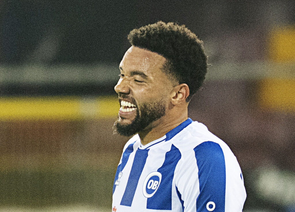 Grot smiler i kamp for OB