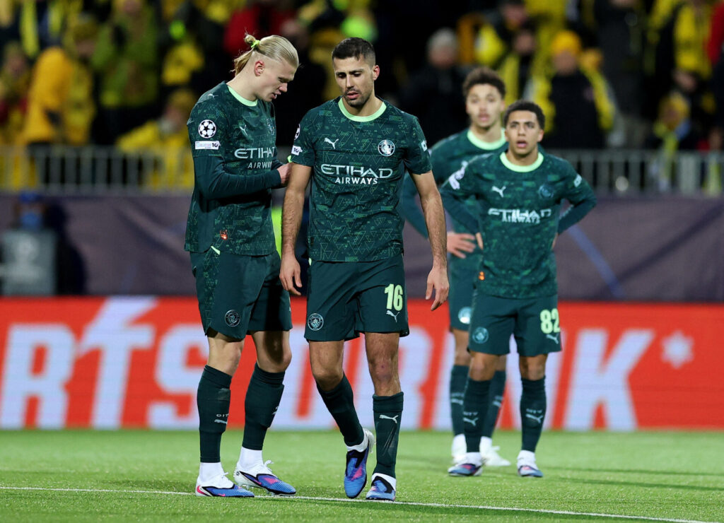 Rodri og Erling Haaland i aktion for Manchester City.