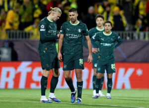 Rodri og Erling Haaland i aktion for Manchester City.