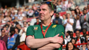 Matthew Benham med armene over kors til en Brentford-kamp i Premier League.