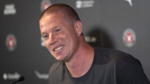 Mike Tullberg med et stort smil.
