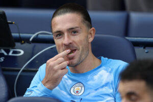 Jack Grealish på bænken for Manchester City.