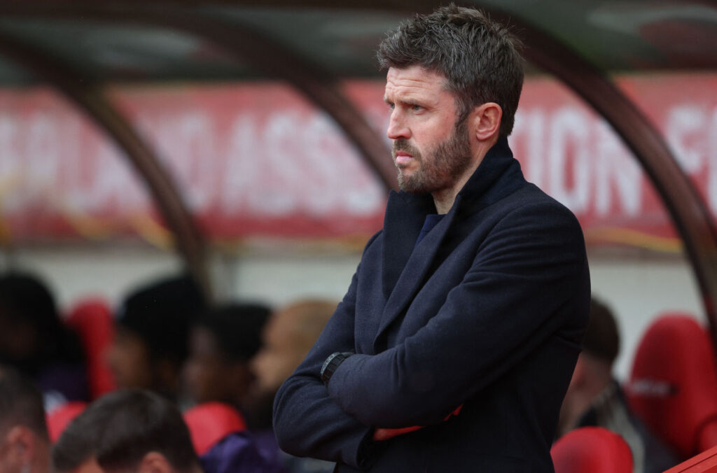 Michael Carrick på Manchester Uniteds bænk.