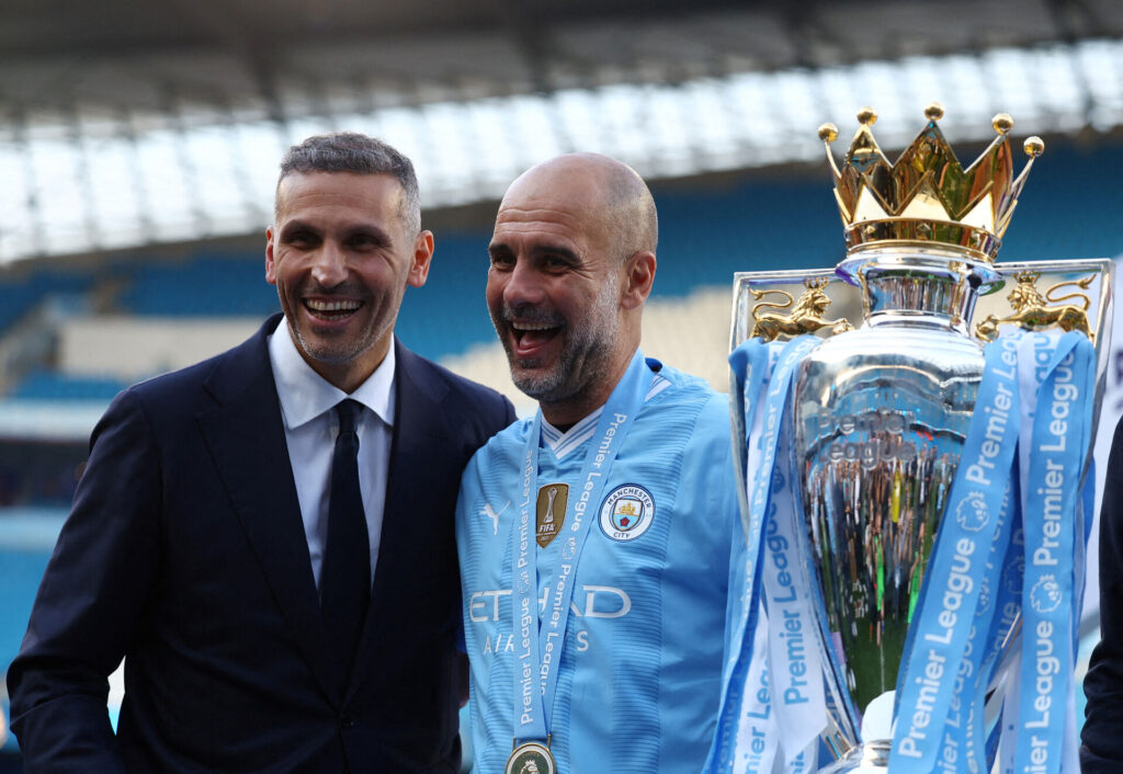 Pep Guardiola og Khaldoon Al Mubarak.