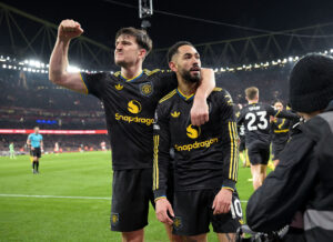 Harry Maguire og Matheus Cunha.