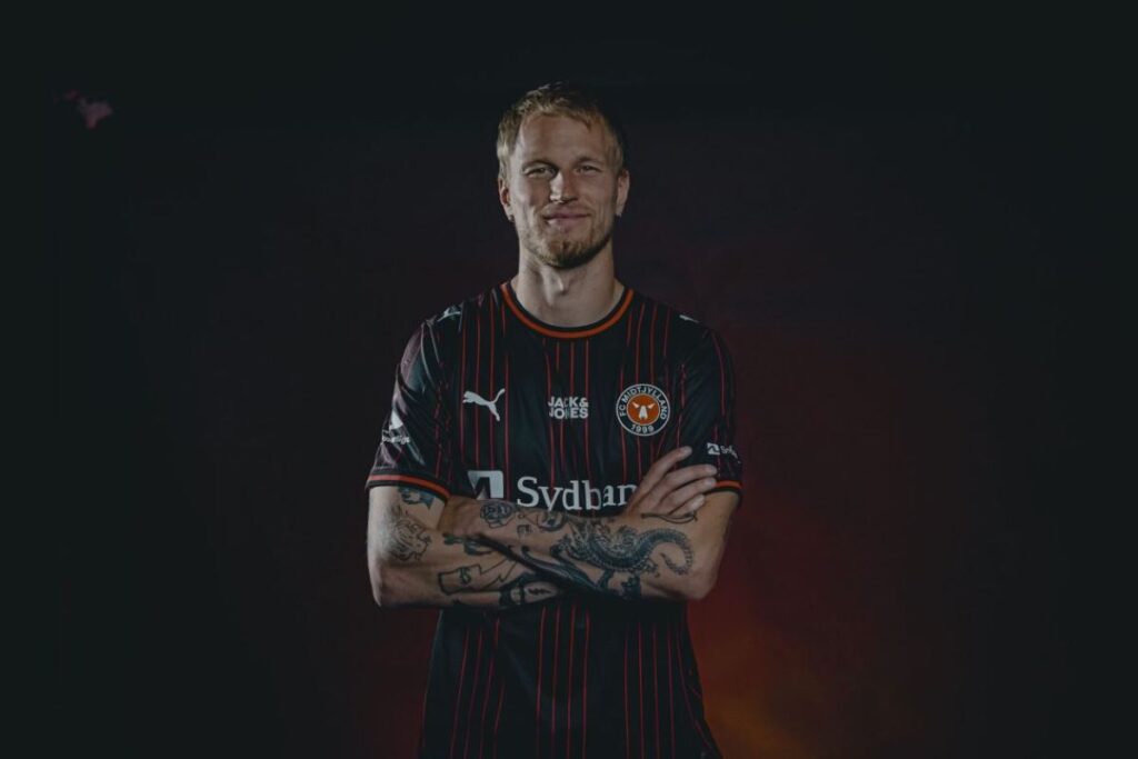 Magnus Jensen med armene over kors